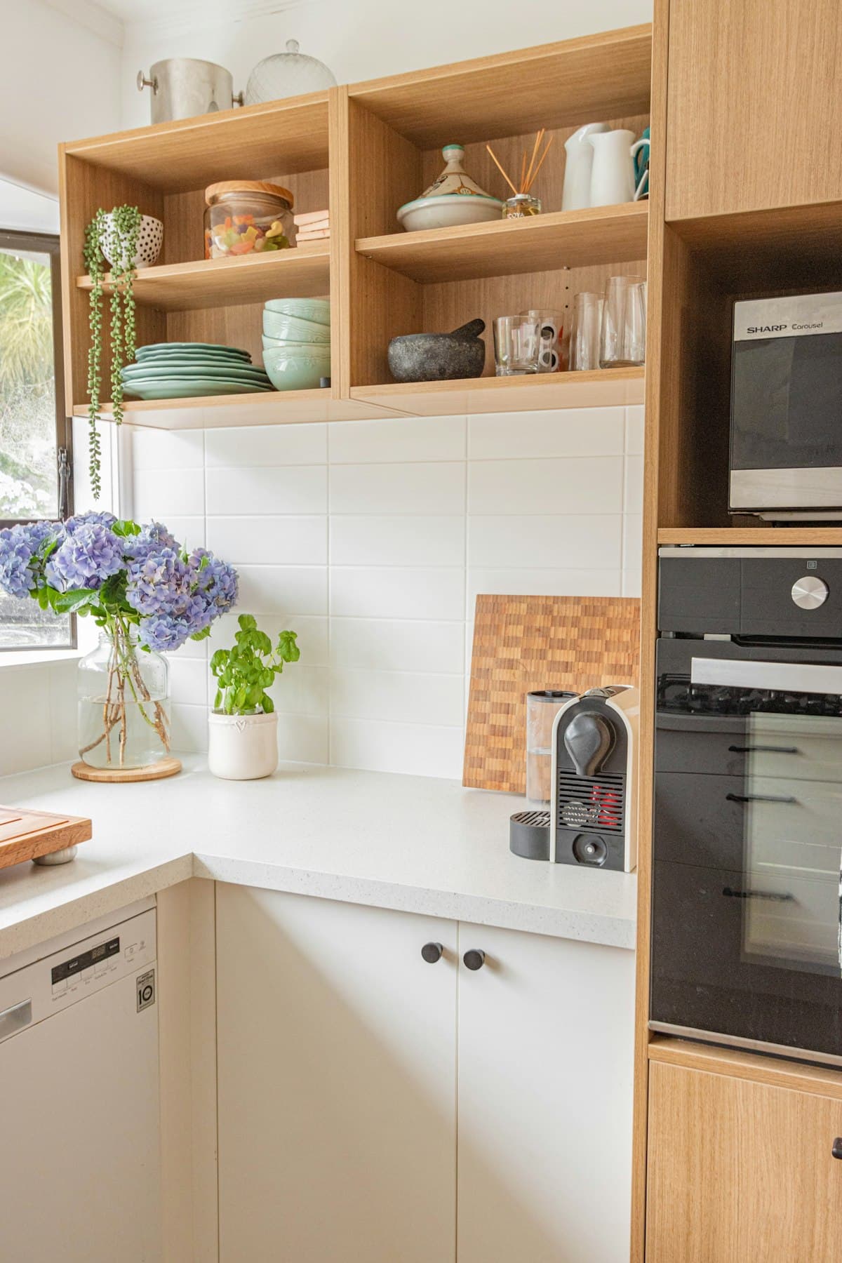Completed bespoke oak kitchen with hand-finished cabinetry and integrated storage, designed and built by Hartwood Joinery